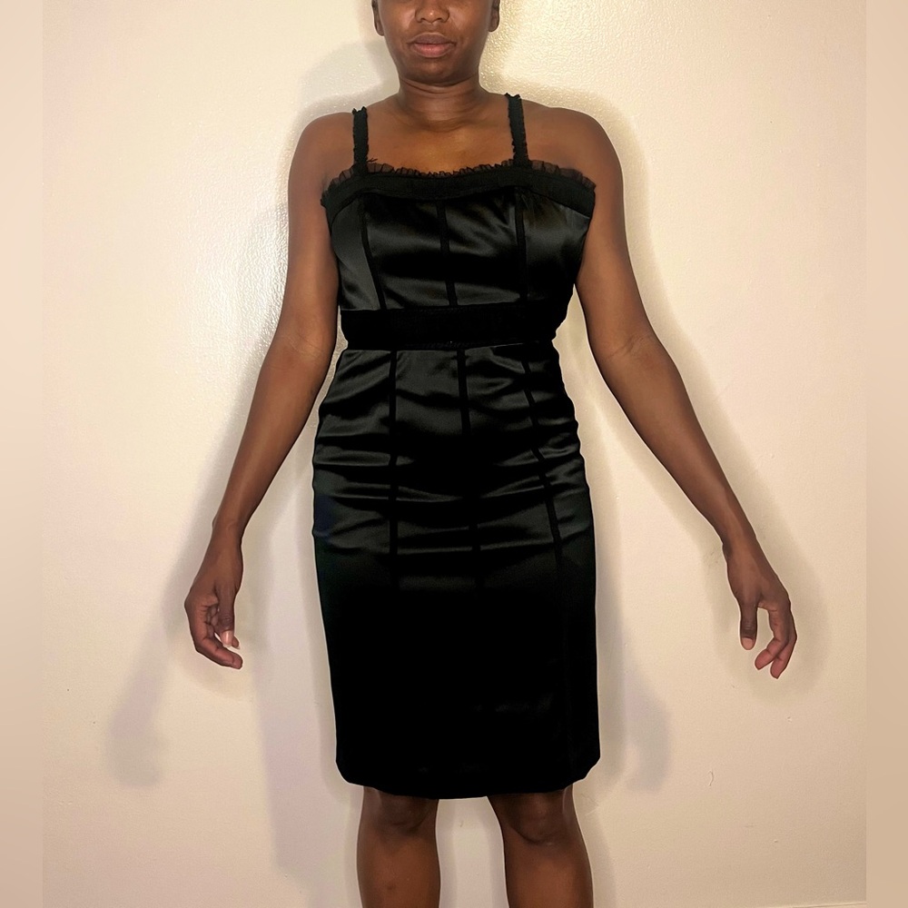 Satin “Feelib” black dress size 6. Corset-like top, ruffle trim w/ a side zipper